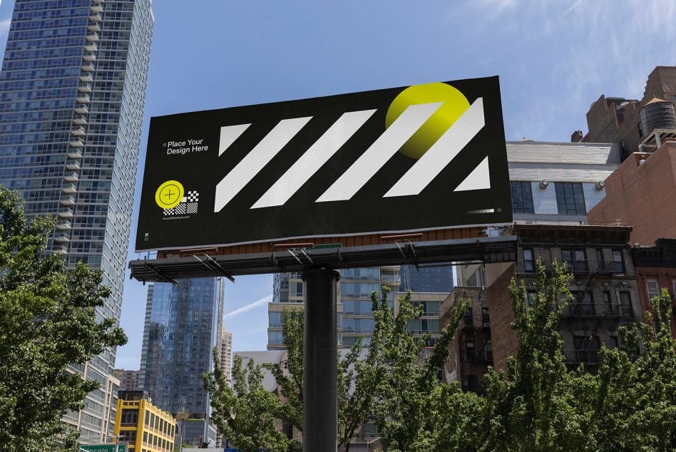 City billboard showing white stripes, yellow sphere, geometric design in downtown skyline