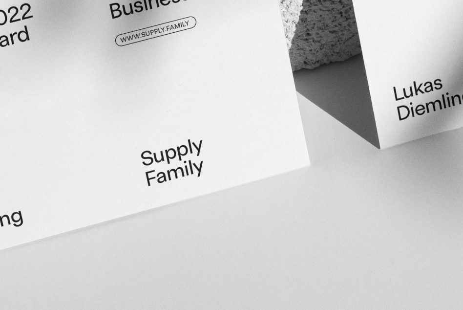 Elegant business card mockup with minimalistic design, clean layout, and modern typography, in black and white for professional presentation.