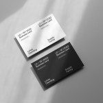 Elegant business card mockup design featuring multiple cards in black and white with shadow overlay, ideal for presentation and portfolio.