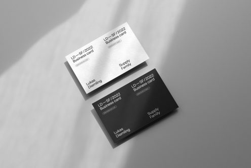 Elegant business card mockup design featuring multiple cards in black and white with shadow overlay, ideal for presentation and portfolio.