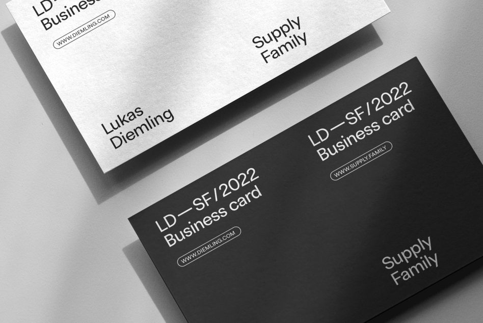 Elegant business card mockup with white and black design, showcasing clean typography, ideal for presentation templates.