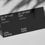 Elegant business card mockup with minimal design, lying on a textured surface for a realistic presentation, perfect for designers, print templates.