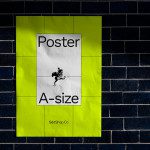 Mockup of a neon green A-size poster hanging on a dark brick wall, showcasing design space for graphics and branding materials.