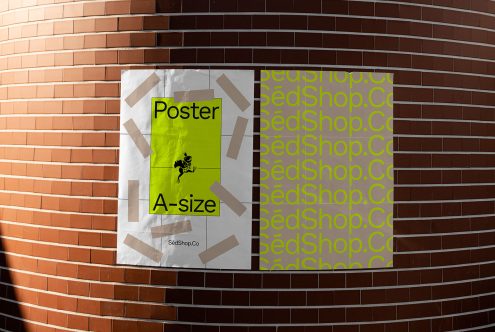 Mockup of a yellow A-size poster with a frog graphic, taped to a curved brick wall, showcasing poster design and presentation for designers.