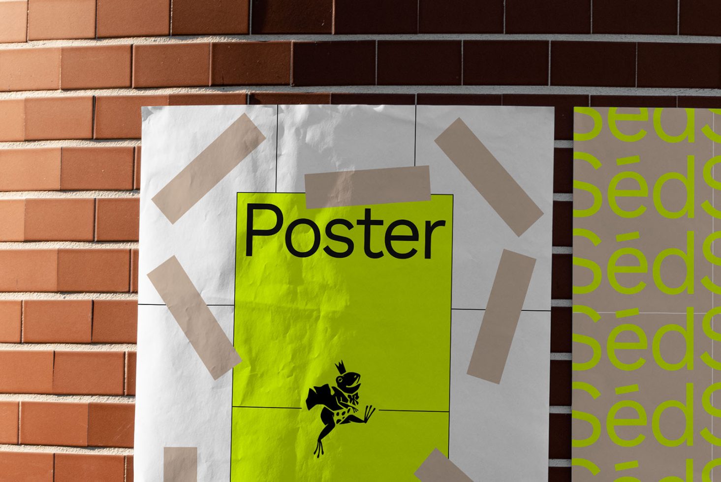 Mockup of a brightly colored poster taped to a brick wall, showcasing design space for graphics and text in urban setting.