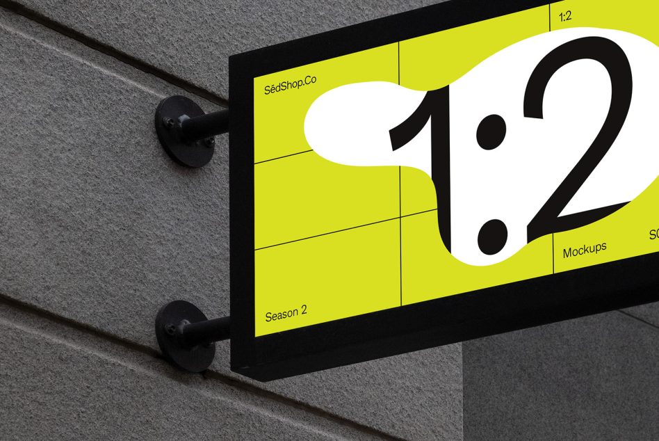 Low angle of horizontal sign mockup on concrete wall with yellow design