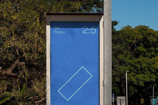 Outdoor advertising mockup of a tall, vertical poster display in a natural setting for designers to present branding graphics and ads.