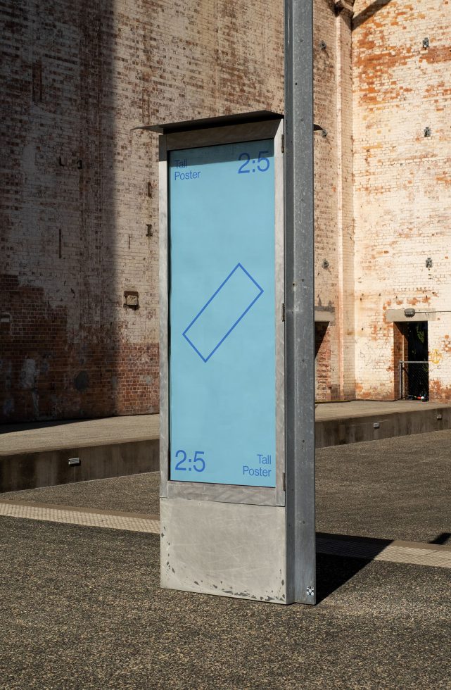 Outdoor street poster mockup on metal stand with urban background for advertising and branding design presentation.