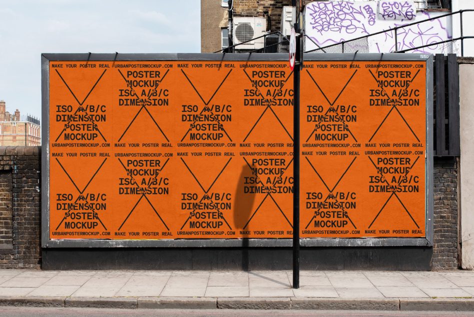 Large orange poster display with six repeated sections showing geometric diamond pattern, urban street setting