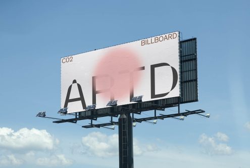 Outdoor billboard mockup with large letters and sky background, ideal for displaying design projects and advertising content for graphic designers.