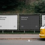 Outdoor billboard mockups displayed beside street with vintage van, ideal for designers to showcase advertising designs in realistic settings.