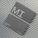 Business card mockup on metal grid background, elegant design presentation, graphic design asset for professional branding.