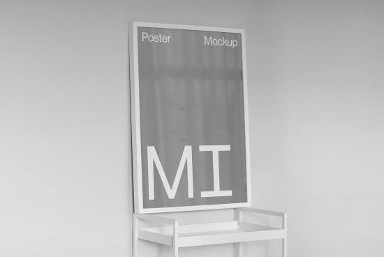 Minimalist poster mockup in monochrome standing on a sleek frame for graphic designers to showcase their work in a modern setting.