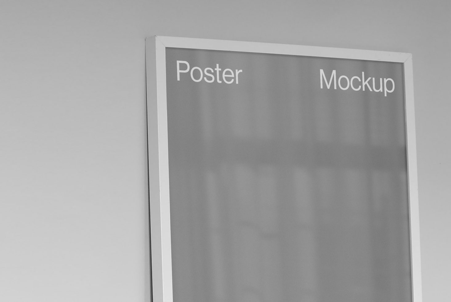 Frame display, wall-mounted poster mockup in grayscale for presentation design, clean and modern, in a minimalistic interior setting.