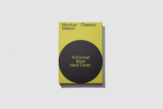 Yellow hardcover book mockup with black circle design on cover for presentation and portfolio display, isolated on white background.