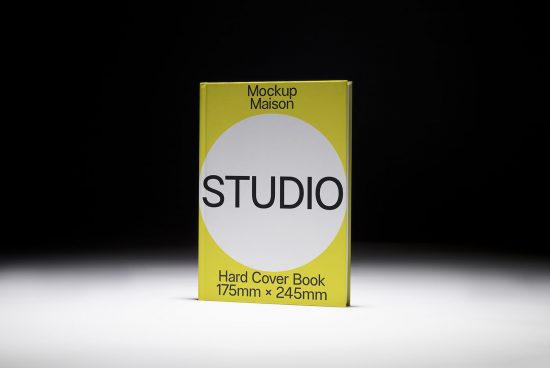 Yellow hardcover book mockup on a black background, ideal for design presentation, realistic graphic template, clean and modern.