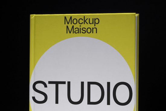 Yellow book with Mockup Maison Studio design cover for mockup presentation on a black background.