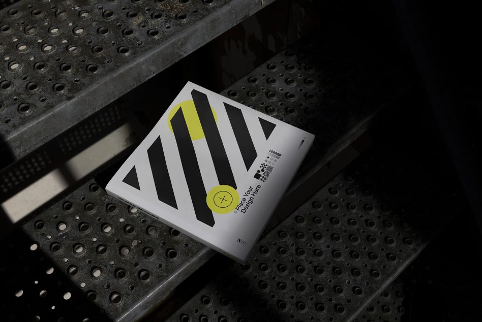 Square white envelope mockup with bold geometric stripes, yellow circle logo