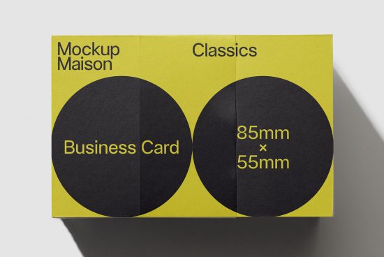 Yellow and black business card mockup showcasing standard 85mm x 55mm size for designers.