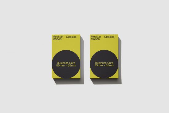 Yellow and black business card mockup with front and back design, standardized 85mm x 55mm size, ideal for graphic presentation and portfolio.