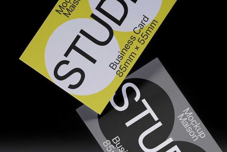 Yellow card showing STUDIO text with business card specs, dark card layered below
