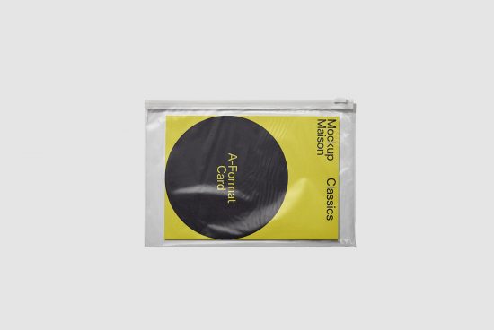 Plastic bag mockup with yellow design booklet inside, clear packaging, isolated on white background, product presentation for designers.
