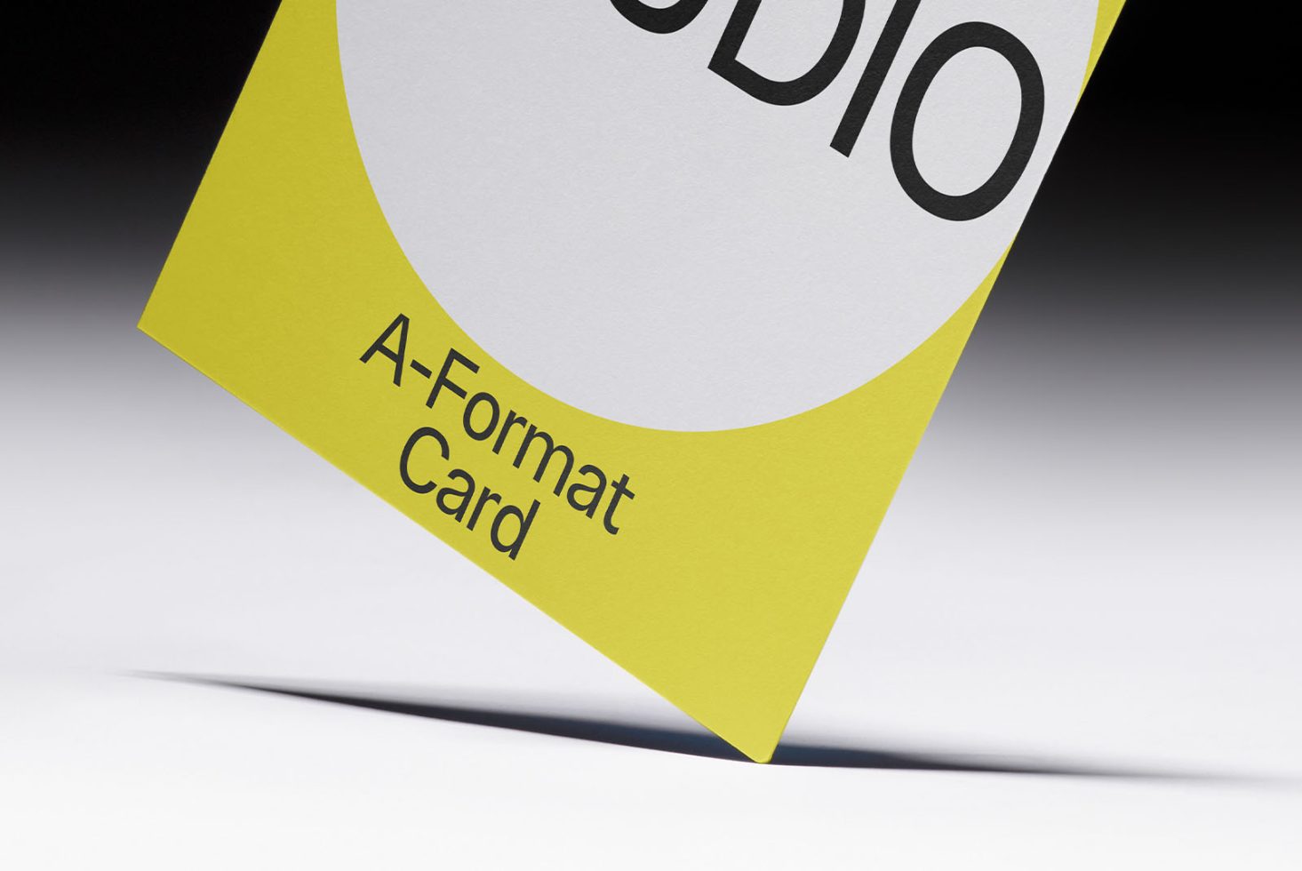 Minimalist A-Format card mockup with lime green and white design on a clean background, ideal for presenting branding or stationery designs.