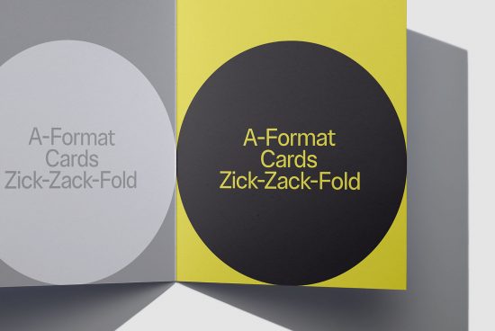Mockup of a-format zick-zack-fold cards with yellow and grey design elements, showcasing print presentation for designers.