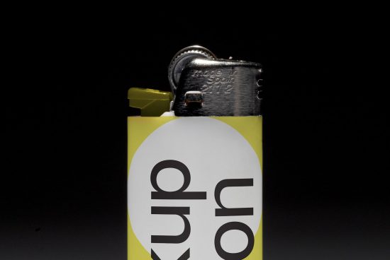 Close-up of a lighter with a custom design for mockup presentation on a dark background, highlighting product branding space.