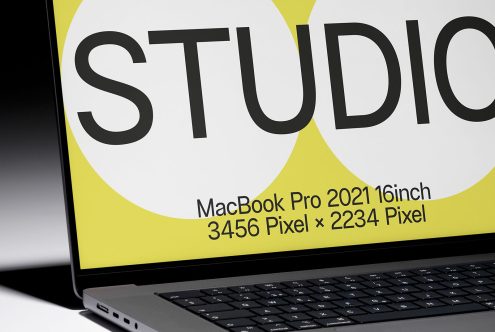 Close-up of MacBook Pro screen with sample design display, ideal for high-resolution device mockups, digital design presentation, creative assets.