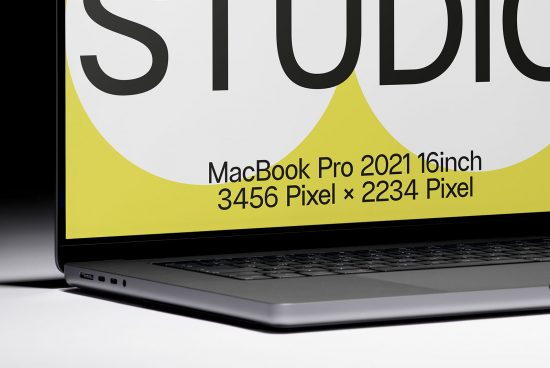 Close-up view of a MacBook Pro 2021 showcasing screen resolution for designer mockups, highlighting the crisp display for digital assets.