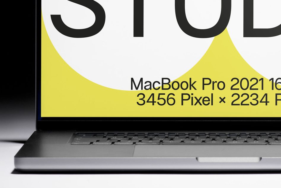 MacBook Pro 16 inch 2021 screen detail showing yellow design element close up