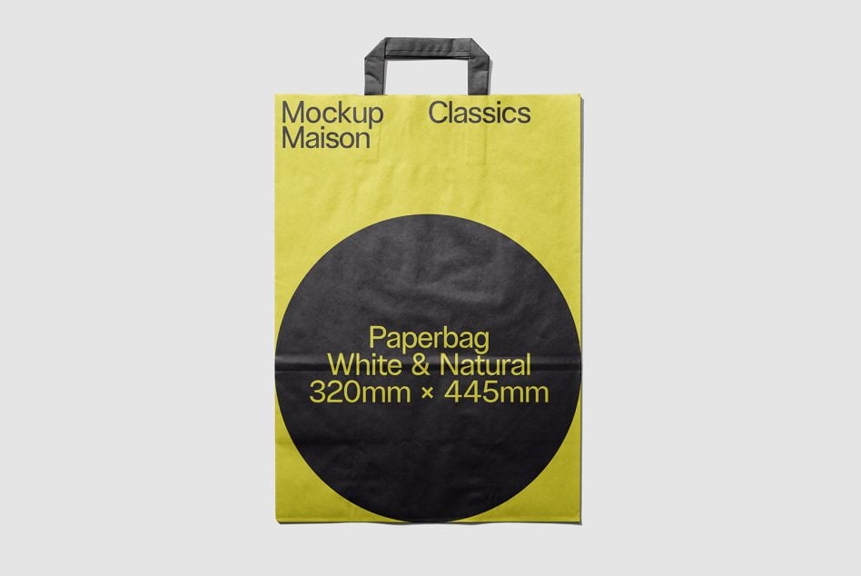 Bright yellow paper bag with dark gray handles showing black circle mockup area