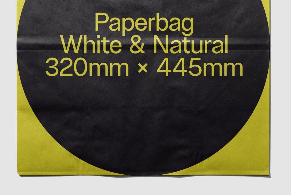 Paper bag mockup in yellow with large dark circular window showing product space