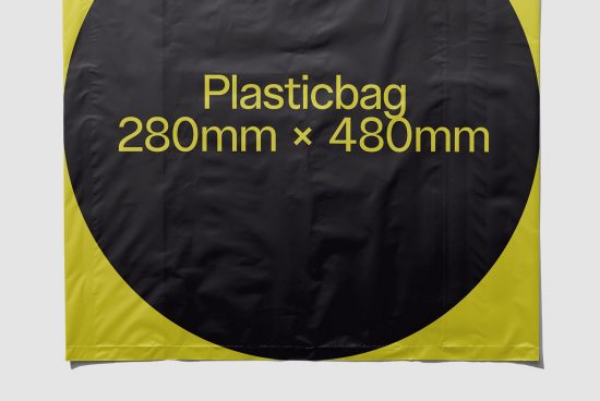 Black plastic bag mockup with yellow details and dimensions on display for packaging design, suitable for graphic templates.
