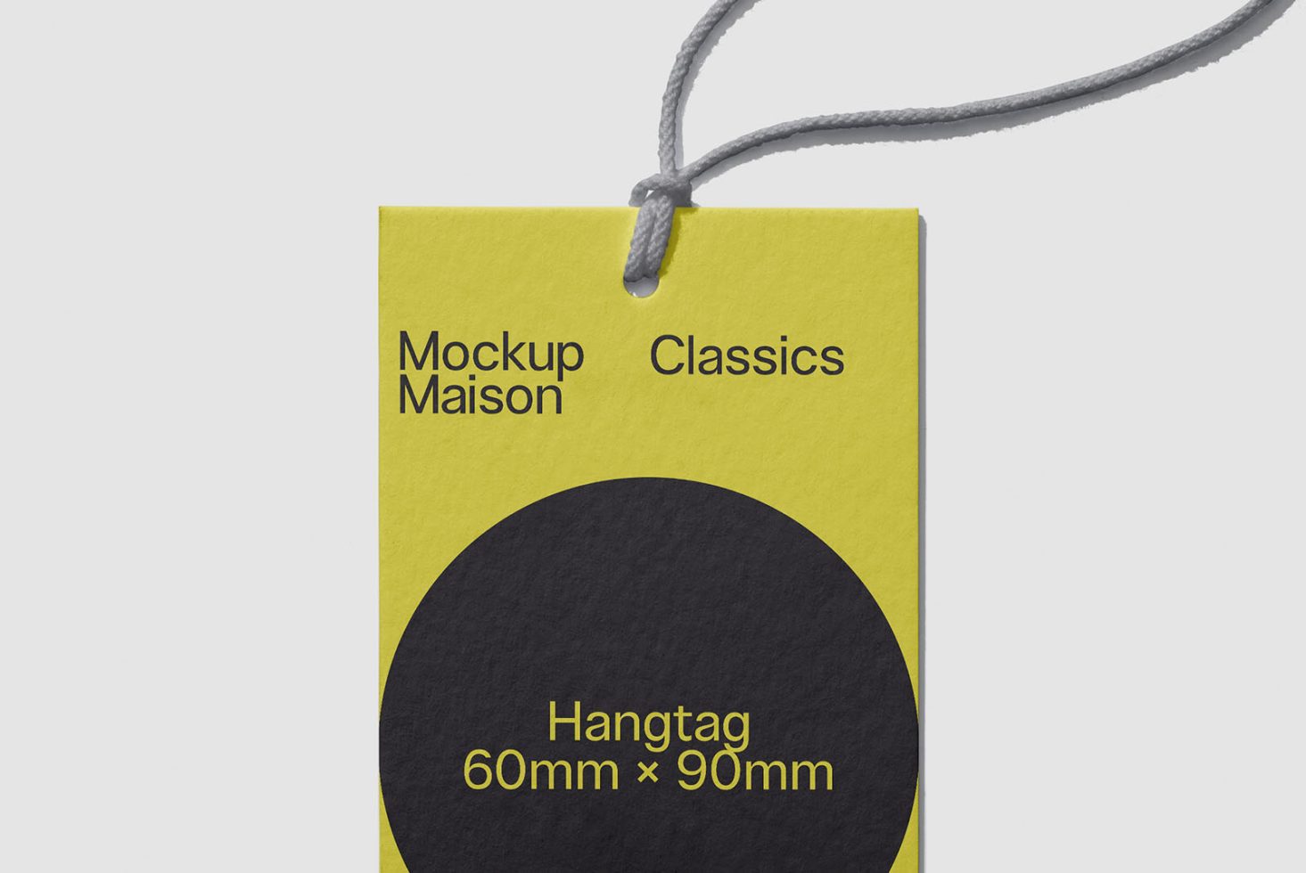 Yellow and black hangtag mockup design 60mm x 90mm with string, isolated on white background, ideal for branding projects and presentations.