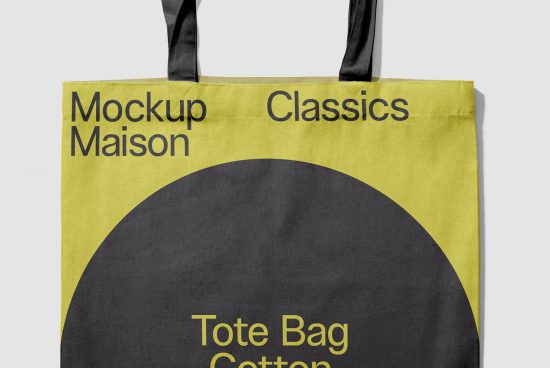 Tote bag mockup hanging, showing half with customizable design for graphics, showcasing branding potential for designers.
