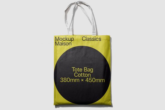 Cotton tote bag mockup in yellow and black with dimensions text, isolated on a white background, ideal for ecommerce and portfolio designs.