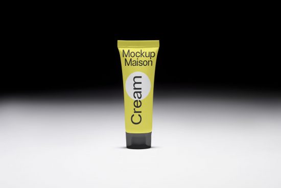Yellow tube cream packaging mockup on a gradient background for product design and branding presentations.