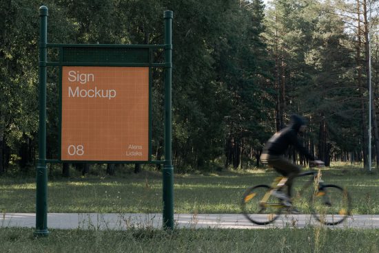 Outdoor sign mockup in a park setting, blur motion cyclist in foreground, realistic scene for branding, editable PSD.