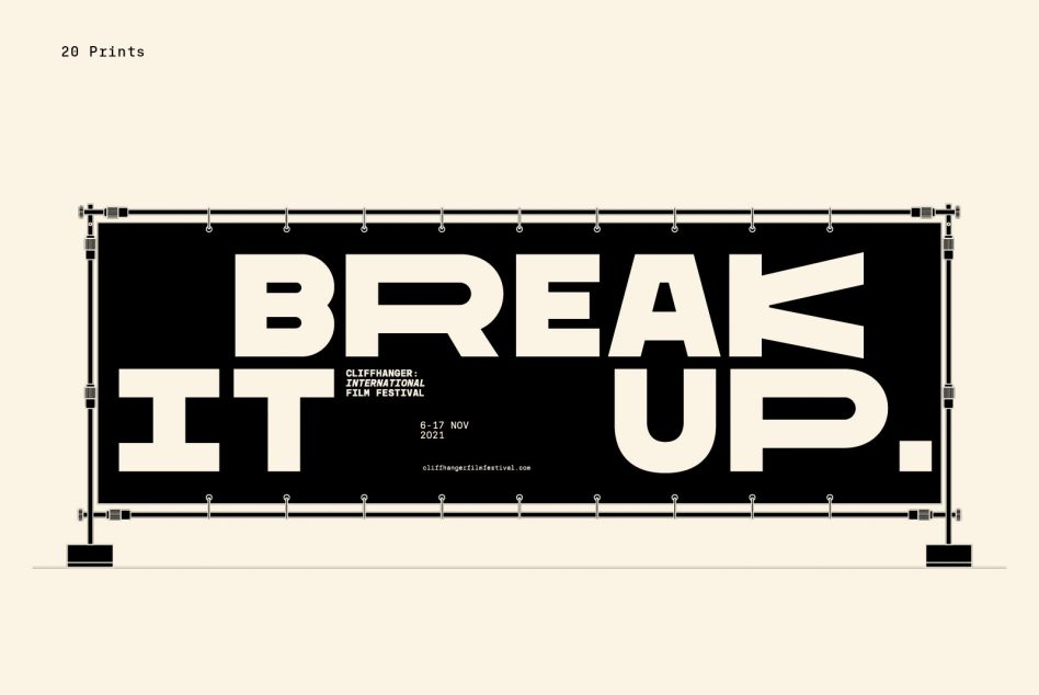 Large billboard with white break it up text on black background