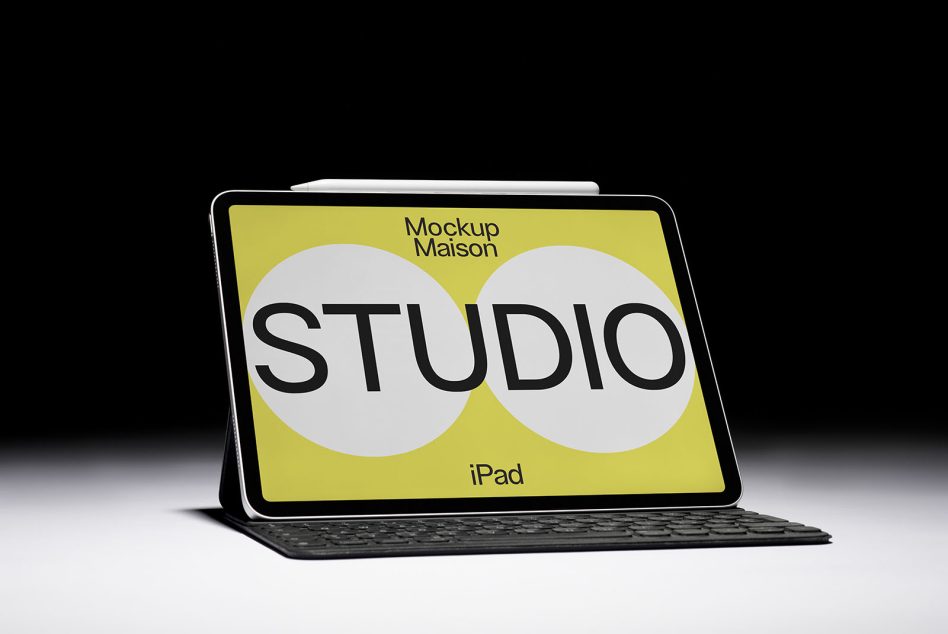 iPad Pro mockup with keyboard on black background, displaying studio design, ideal for presentations and digital mockups for designers.