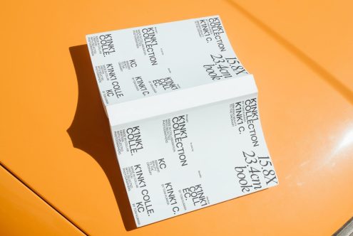 Event ticket mockup with modern typography on orange background, ideal for designers creating visuals for event promotions.