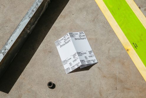 Printed brochure mockup on concrete surface with shadow, urban design presentation, graphic design template.