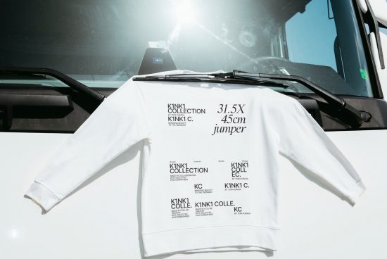 White jumper apparel mockup with text design, displayed on a truck dashboard for a realistic presentation, suitable for fashion designers.