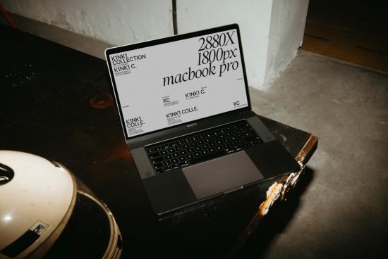 Laptop mockup with scalable screen on a dark table, showcasing design template for branding, suitable for designers looking for realistic mockups.