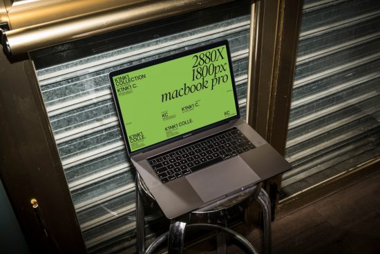 Laptop mockup on stool with screen displaying design dimensions, ideal for showcasing web graphics and UI designs to clients.