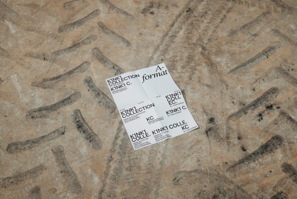White A-format flyer mockup on concrete surface with herringbone pattern texture