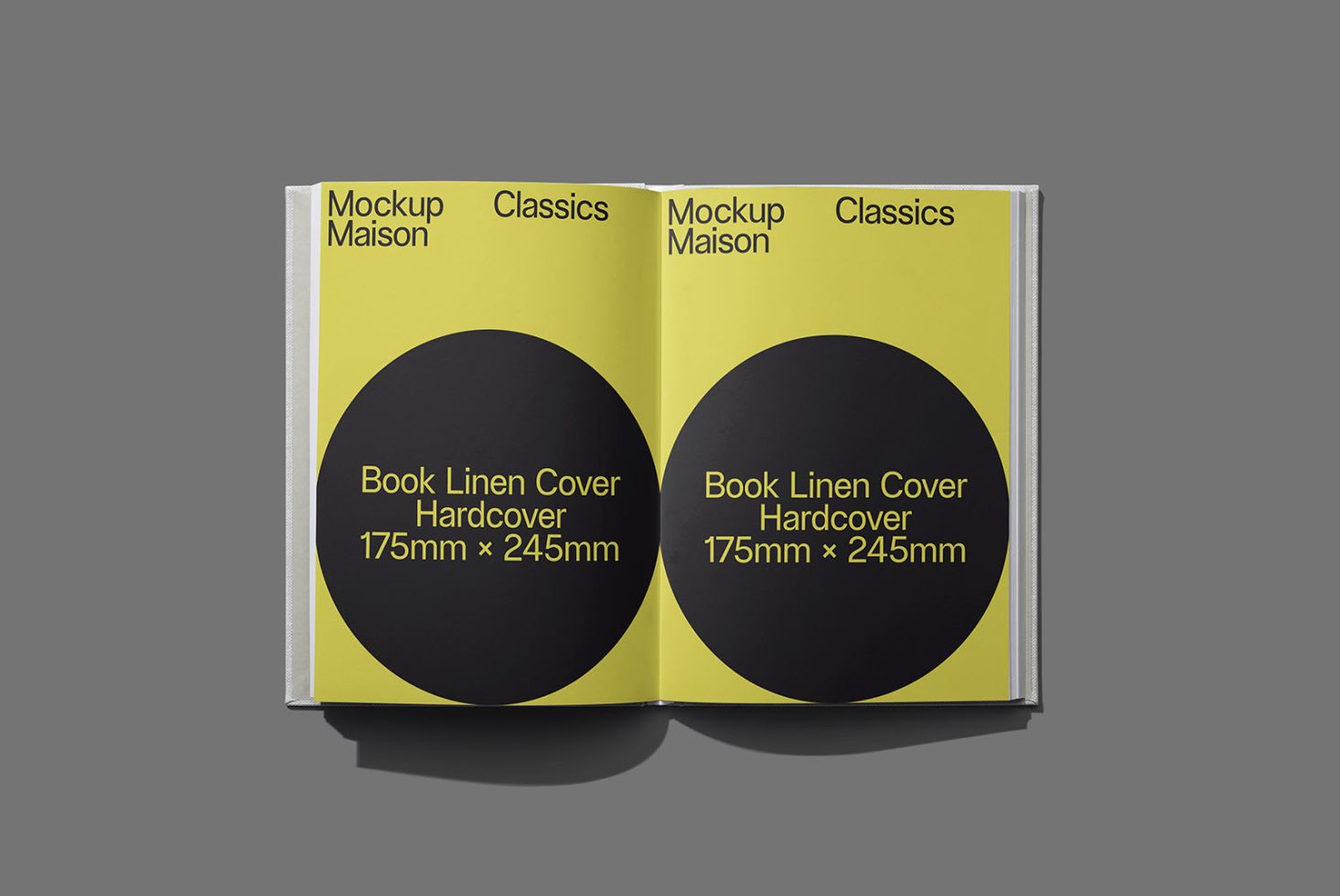 Yellow and black book hardcover mockup with linen texture design, open and standing on grey background, suitable for graphic designers.