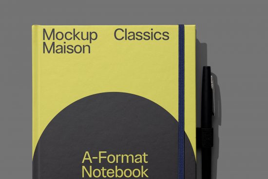 Yellow notebook mockup with pen on gray background, showcasing design space on cover, ideal for presentations, branding, stationery graphics.